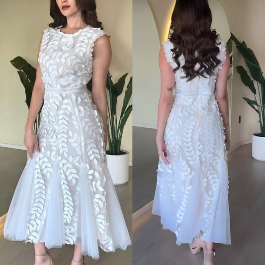 Vestido blanco tulle y pétalos 🤍