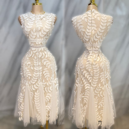 Vestido blanco tulle y pétalos 🤍