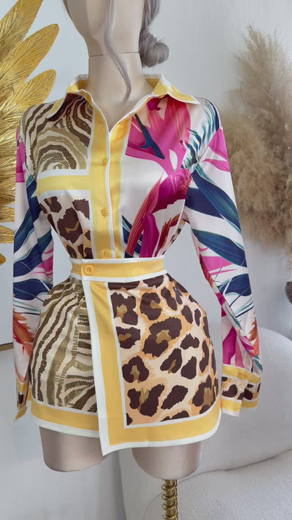Conjunto blusa satín y falda/short